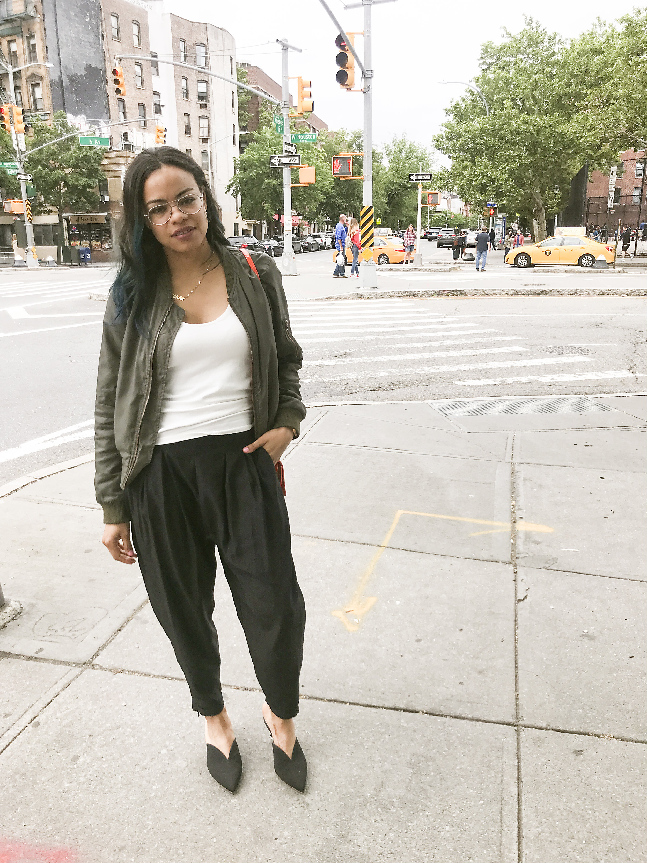 Tee: Tibi. Pant: Urban Outfitters. Shoes: Attico. Jacket: no brand. Eyeglasses: Porche Design&nbsp;